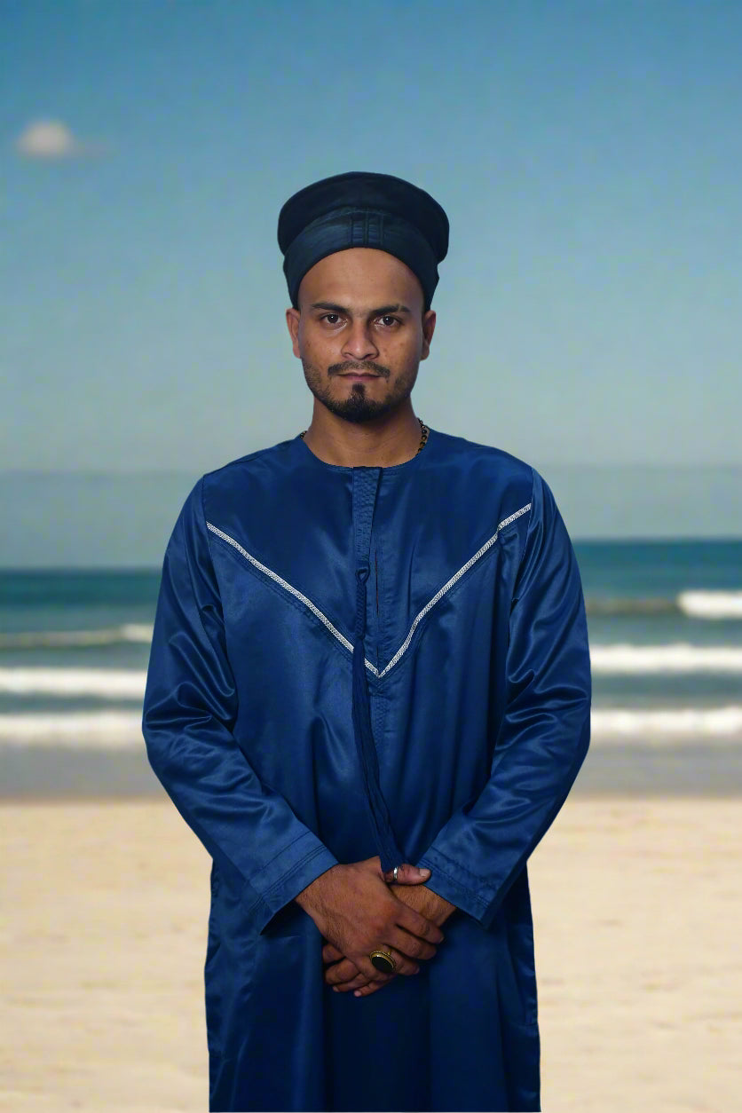 Man wearing a blue outfit with a white background