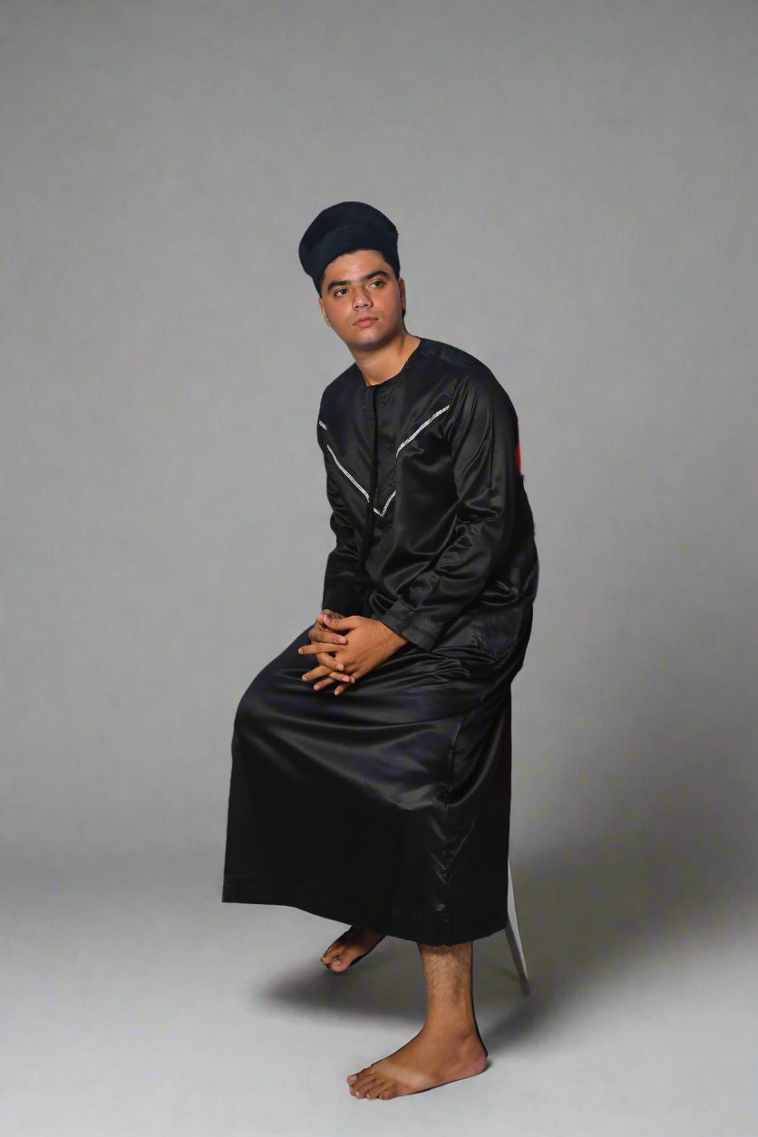 Person sitting on a ladder against a white background