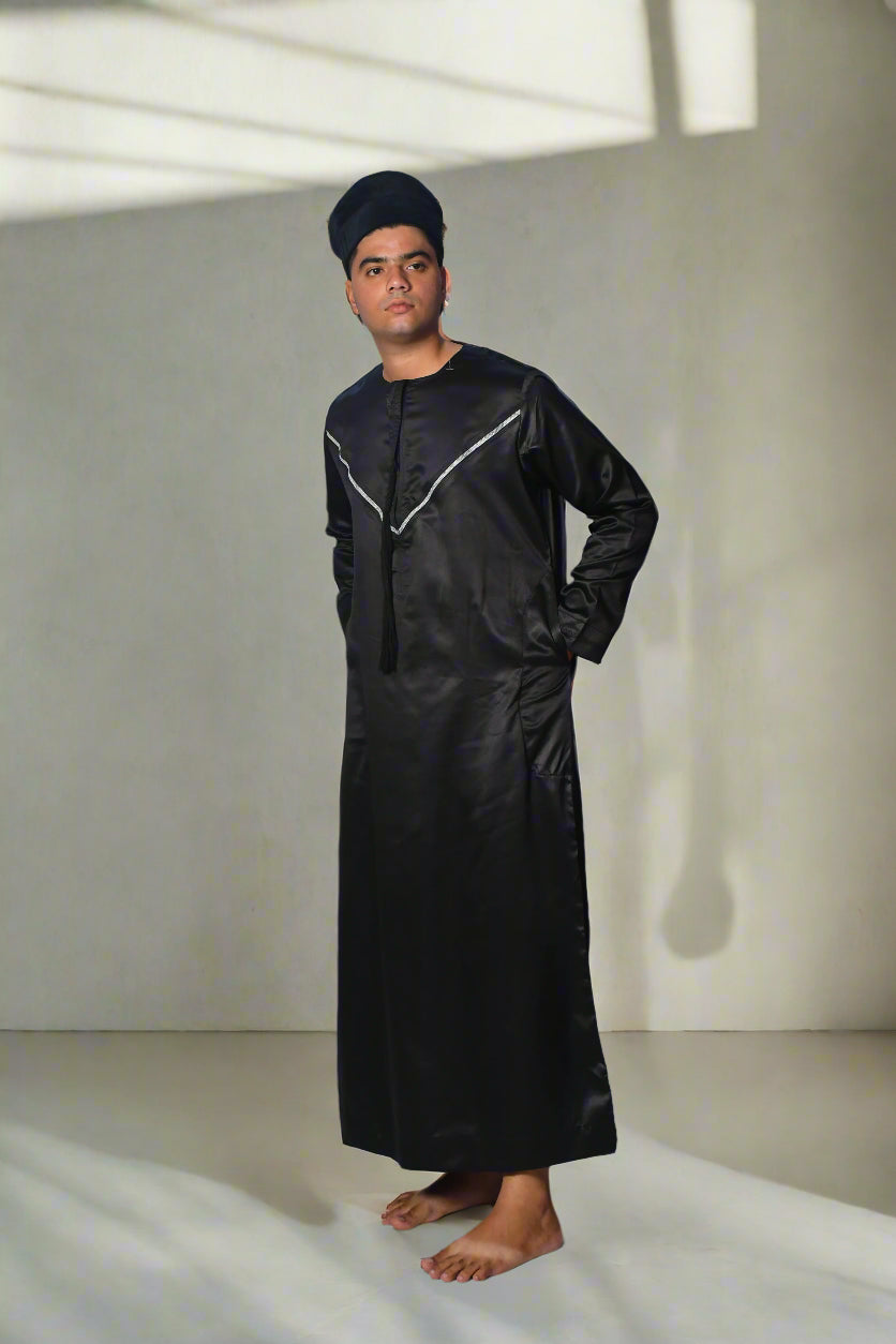 Person wearing a black raincoat on a white background
